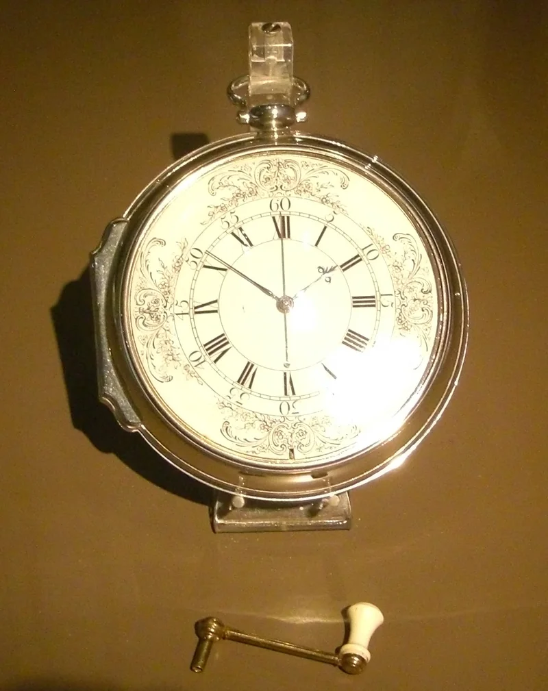 John Harrison’s H4 chronometer, a large silver watch, with its winding key.